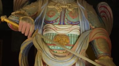 Korean wooden guardian in Bulguksa temple in Gyeongju, South Korea. Korean god statue. High quality 4k footage.
