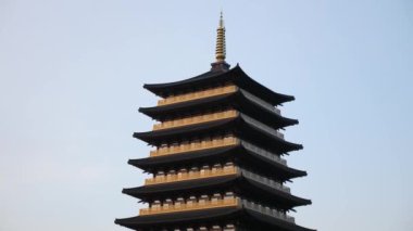 Scenic view of tall eight floors pagoda in traditional korean style village in Gyeongju in South Korea. High quality 4k footage.