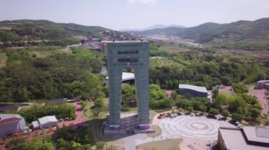 Aerial footage of a Gyeongju Tower. Traditional korean style pagoda inside a building in Gyeongju in South Korea. Close to Expo areal. High quality 4k footage.