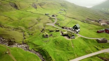 Aerial view of Saksun village, Faroe Islands. Beautiful green nature in Saksun. High quality 4k footage.
