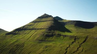 Aerial view of a faroese mountains, Faroe Islands. Sunny day in summer. Amazing nature in Faroe Islands. The top of the Summits in Faroe islands. Eysturoy Island. Gonguturur or Hvithamar Trailhead.