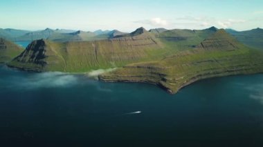 Aerial view of a Funningur Scenic Point, Faroe Islands. Sunny day in summer. Amazing nature in Faroe Islands. Eysturoy Island. Gonguturur or Hvithamar Trailhead. High quality 4k footage
