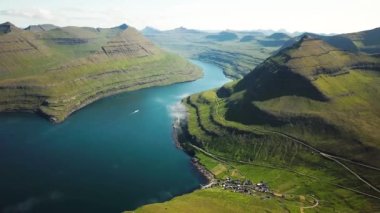 Aerial view of a Funningur Scenic Point, Faroe Islands. Sunny day in summer. Amazing nature in Faroe Islands. Eysturoy Island. Gonguturur or Hvithamar Trailhead. High quality 4k footage