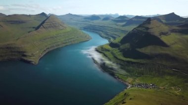 Aerial view of a Funningur Scenic Point, Faroe Islands. Sunny day in summer. Amazing nature in Faroe Islands. Eysturoy Island. Gonguturur or Hvithamar Trailhead. High quality 4k footage