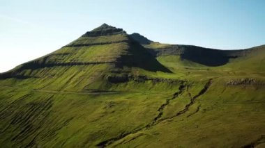 Aerial view of a faroese mountains, Faroe Islands. Sunny day in summer. Amazing nature in Faroe Islands. The top of the Summits in Faroe islands. Eysturoy Island. Gonguturur or Hvithamar Trailhead.