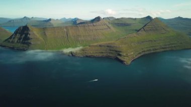 Aerial view of a Funningur Scenic Point, Faroe Islands. Sunny day in summer. Amazing nature in Faroe Islands. Eysturoy Island. Gonguturur or Hvithamar Trailhead. High quality 4k footage