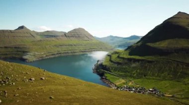 Aerial view of a Funningur Scenic Point, Faroe Islands. Sunny day in summer. Amazing nature in Faroe Islands. Eysturoy Island. Gonguturur or Hvithamar Trailhead. High quality 4k footage