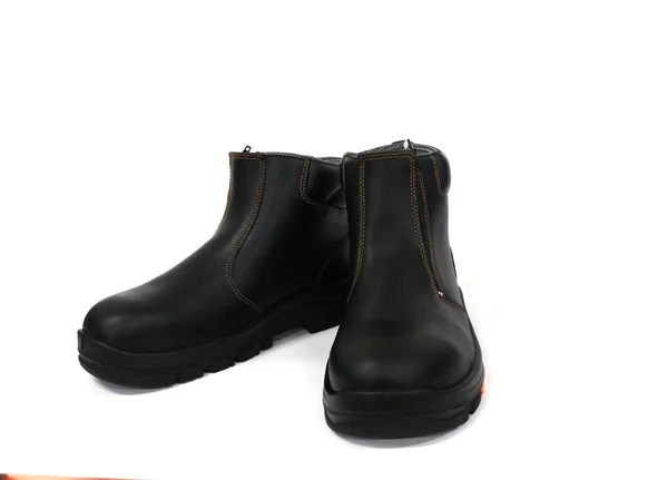 Günlük aktiviteler için havalı siyah çizmeler ve ayakları koru. İşçiler bu ayakkabıları iş kazalarına karşı ayaklarını korumak için de giyerler..