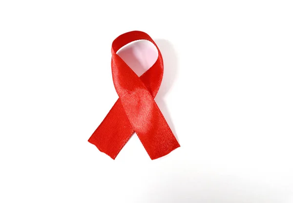 世界エイズデー記念リボン リボンはエイズの病気の存在を思い出させるために使用されます ロイヤリティフリーのストック写真