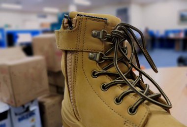 White boots for daily activities and protect the feet. Workers also wear these shoes as foot protection while working to protect their feet from work accidents.