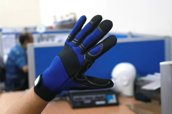 Photo Mechanical Gloves Blue Photo Has Bokeh Background — Foto Stock