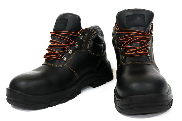毎日の活動のためのクールなブーツと足を保護します 作業者は足を事故から守るために足を保護するためにこれらの靴を着用します — ストック写真