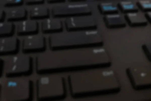 Blurrコンピュータデバイスからキーボードの写真 この写真は背景に適しています — ストック写真