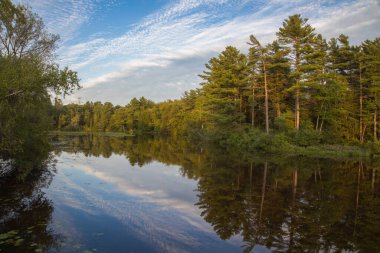 beautiful river landscape forest tranquil peaceful water reflections Windsor Quebec