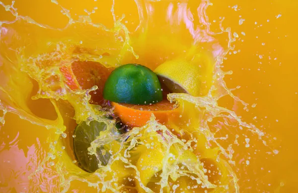 orange juice splashing lime lemon sliced fruit splash flavor liquid explosion drops drink