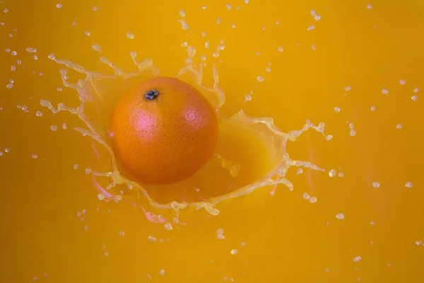 one orange juice splashing fruit splash flavor liquid explosion drops drink