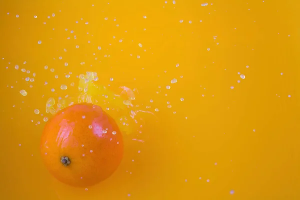 one orange juice splashing fruit splash flavor liquid explosion drops drink