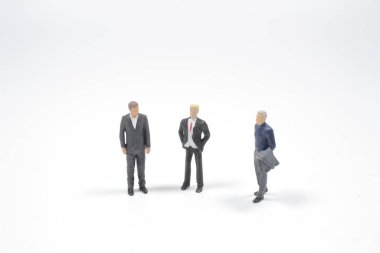 Küçük bir iş adamı minyatür figürü takımı.