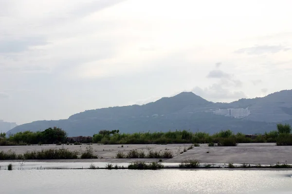 the stagnant water at the site, after the rai