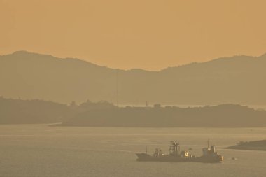 Park Island Hong Kong 'un günbatımı.
