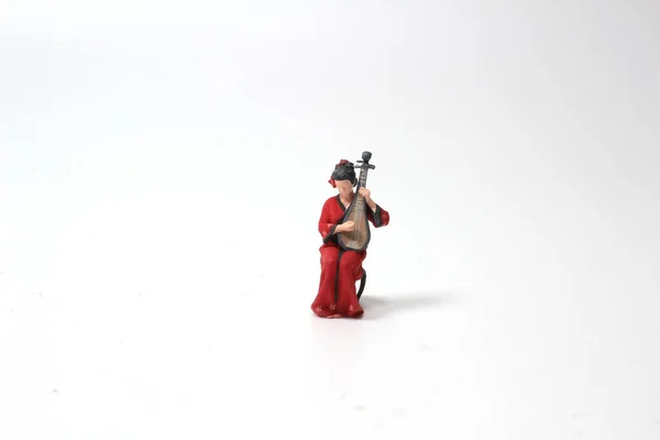 Mini Figura Tocando Laúd Tablero — Foto de Stock