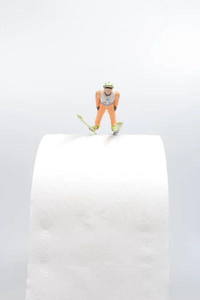 Mini Figure Ski Jumper Competes Toilet Paper — Stock Photo, Image