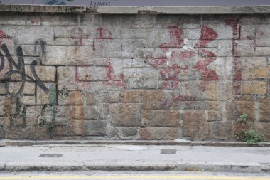 10 Jan 2022 the graffiti on the old rock stone wall texture