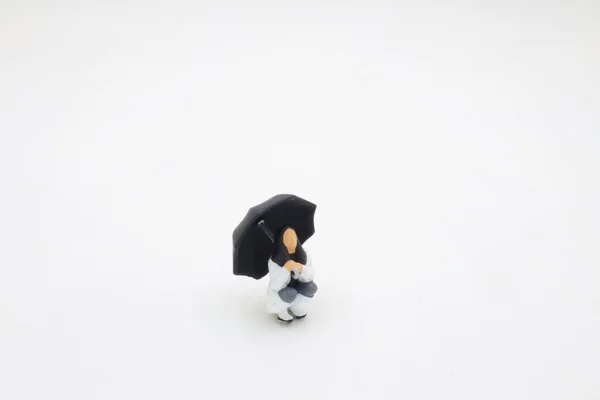 Mini Figure Sits Umbrella — Fotografia de Stock