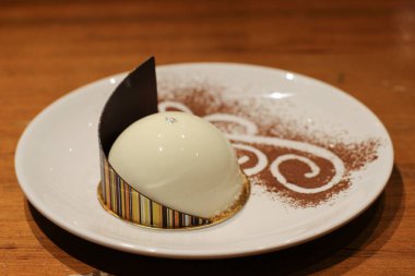 the cake of delicious with chocolate on white plate 