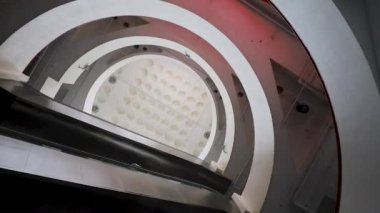 bottom view of escalator and levels of mall in Hong Kong
