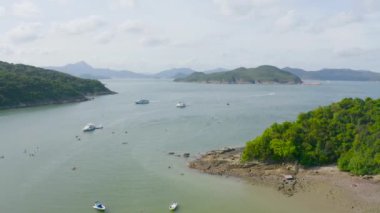 4 May 2022 the rowers on canoes floating to shore at sai kung