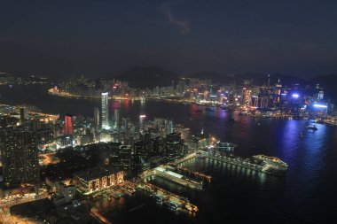 10 Dec 2011  Victoria Harbour with the background of the Tsim Sha Tsui at night