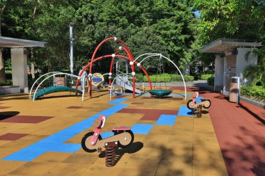 16 Aug 2022 children yellow playground activities in public green park modern
