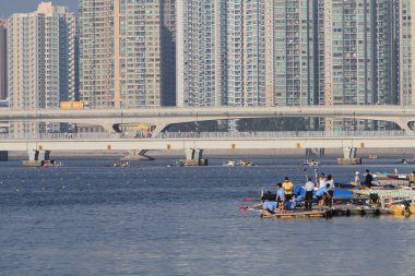 5 Nov 2011 people on the pier on the shore, waiting to board pleasure boats