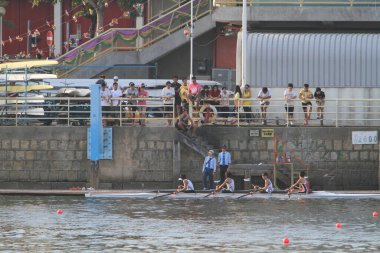 5 Nov 2011 people on the pier on the shore, waiting to board pleasure boats