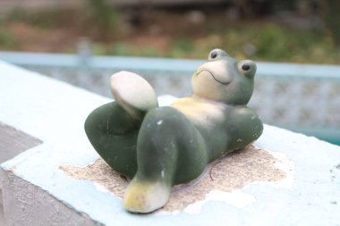 5 March 2011 a frong doll decorated in the garden