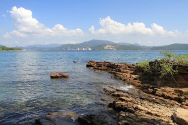 Sedimentary rocks with a variety of marine abrasion landforms along its coast