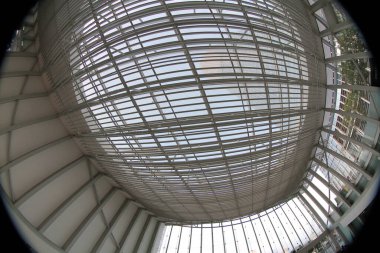18 Dept 2011 glass ceiling in public building with metal columns, abstract background