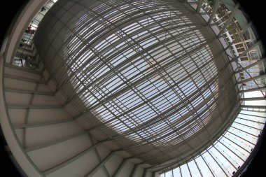 18 Dept 2011 glass ceiling in public building with metal columns, abstract background