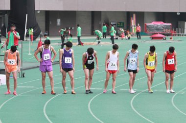 21 Mayıs 2011 'de Tseung Kwan O Sports Ground' da koşucu