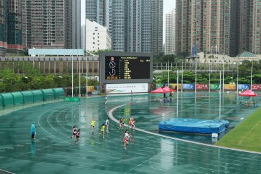 21 Mayıs 2011 'de Tseung Kwan O Sports Ground' da koşucu