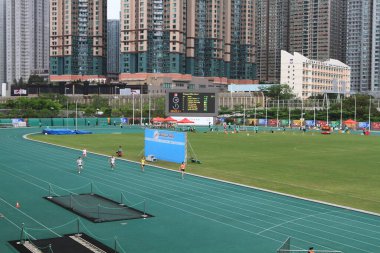 21 Mayıs 2011 'de Tseung Kwan O Sports Ground' da koşucu
