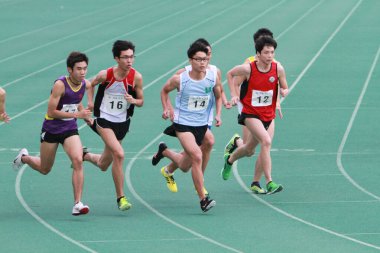 21 Mayıs 2011 'de Tseung Kwan O Sports Ground' da koşucu