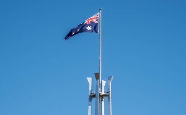 Flag flying at the Parliament building in Canberra Australia