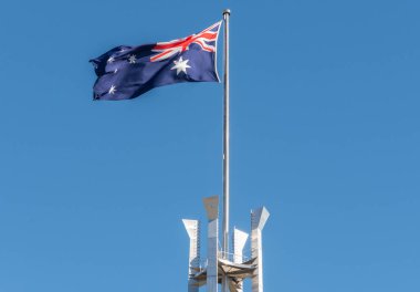 Flag flying at the parliament building in Canberra Australia