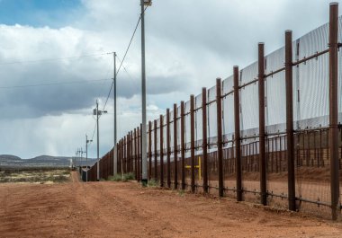 Border wall separating Arizona and Mexico