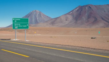 Highway sign high in the Andes Mountains in Chile near the border with Bolivia