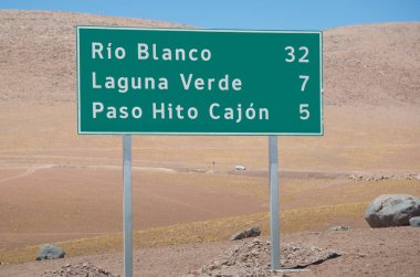 Highway sign high in the Andes Mountains in Chile