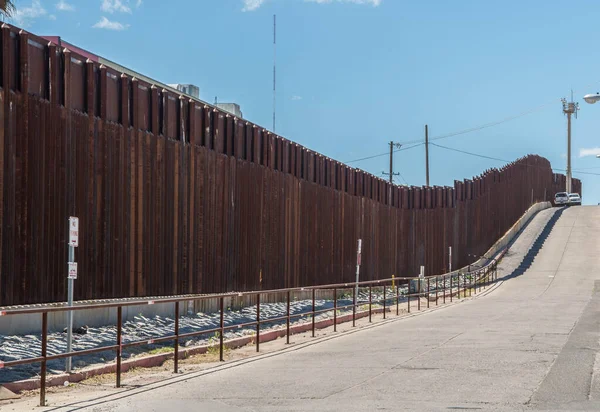 Border wall separating Arizona and Mexico