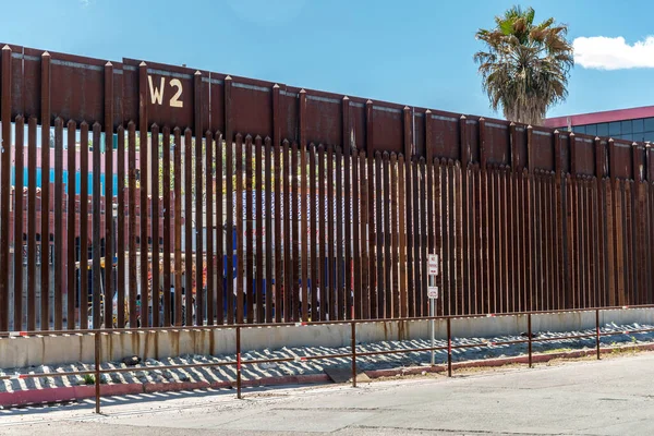 Border wall separating Arizona and Mexico
